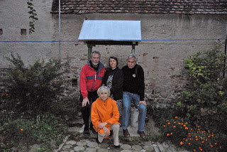Grosspold Ebner Hof, L-R: Paul, second cousin Maria Roth, Bill and Me kneeling