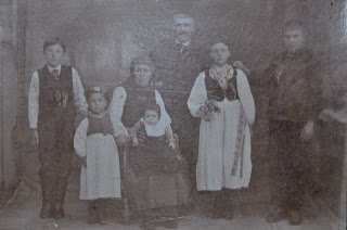 Maria Ebner/Sonnleitner, seated, my grandmother's sister and her family. Andreas far left, Maria Roth's father.