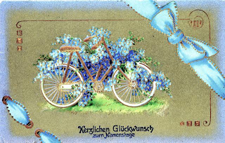 It reads "Heartfelt Good Wishes for your Name Day Dated November 18, 1910, Josef Gärtz sent this postcard to his sweetheart, Lisi Ebner to arrive on her Names Day, Nov. 19th, 1910